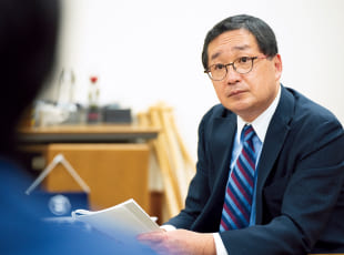 毎日新聞社 中根正義