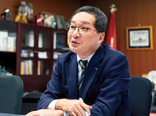 毎日新聞社 中根正義