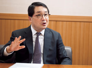毎日新聞社 中根正義